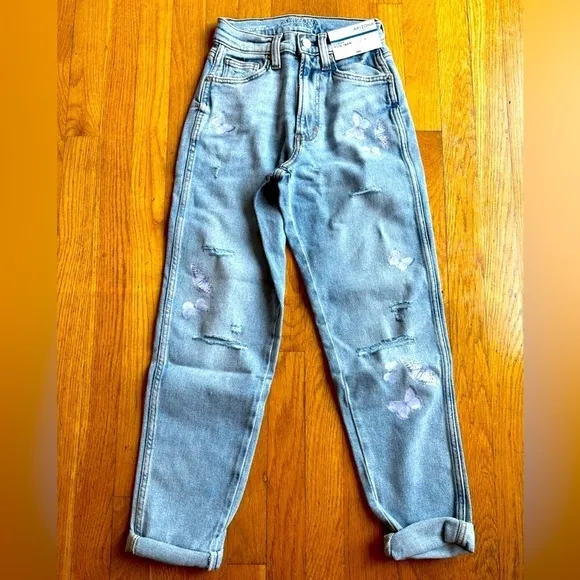 Arizona jean co high waist relaxed jeans ripped with butterfly stitching size 1