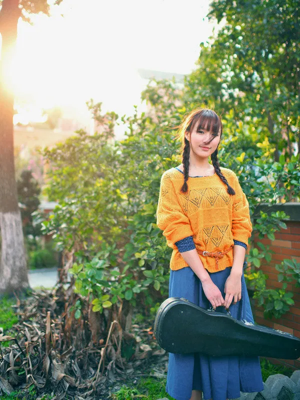 rear buttoned batsleeve loose sweater