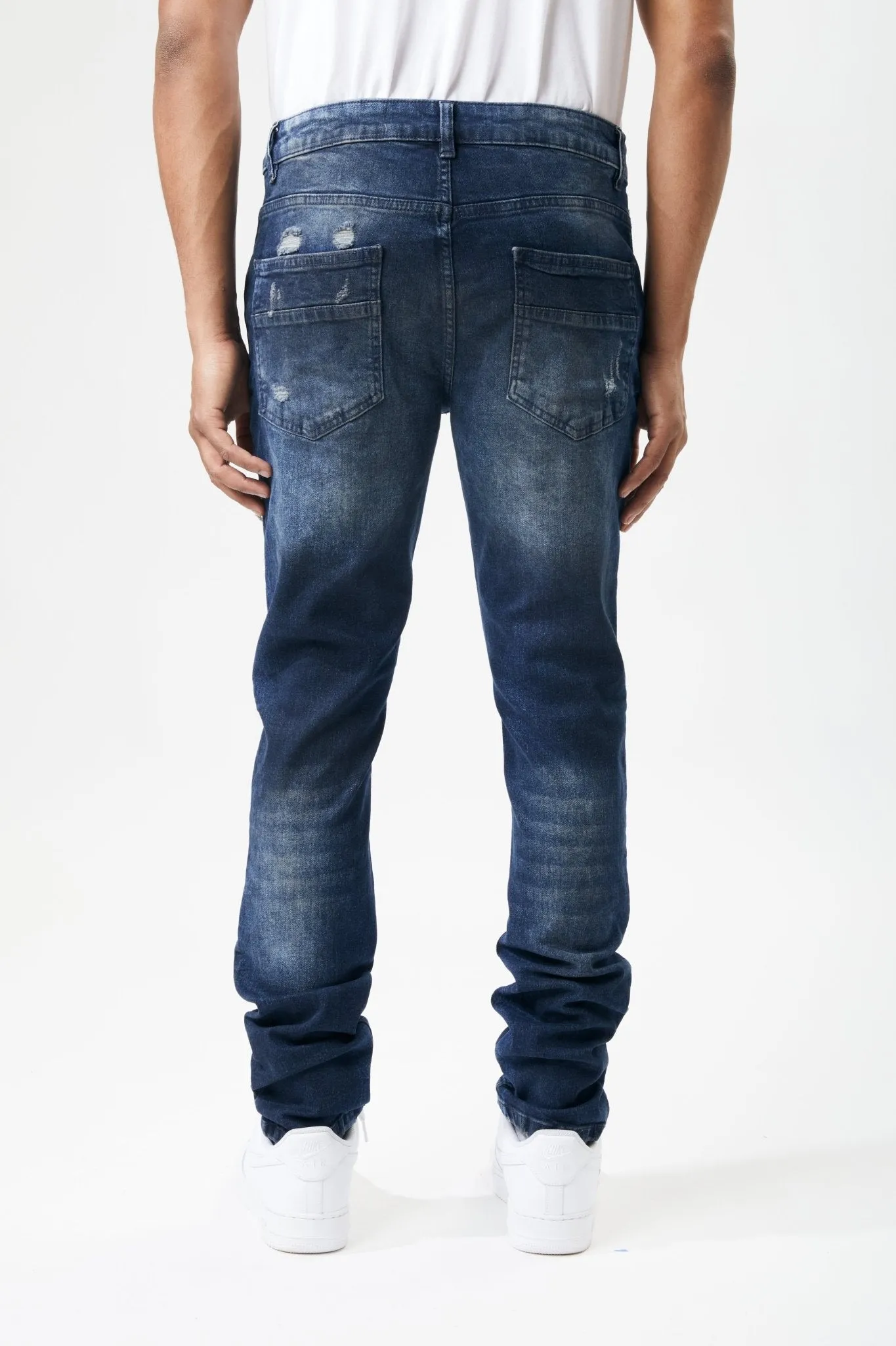 Ripped and Repaired Denim Jeans in Ink