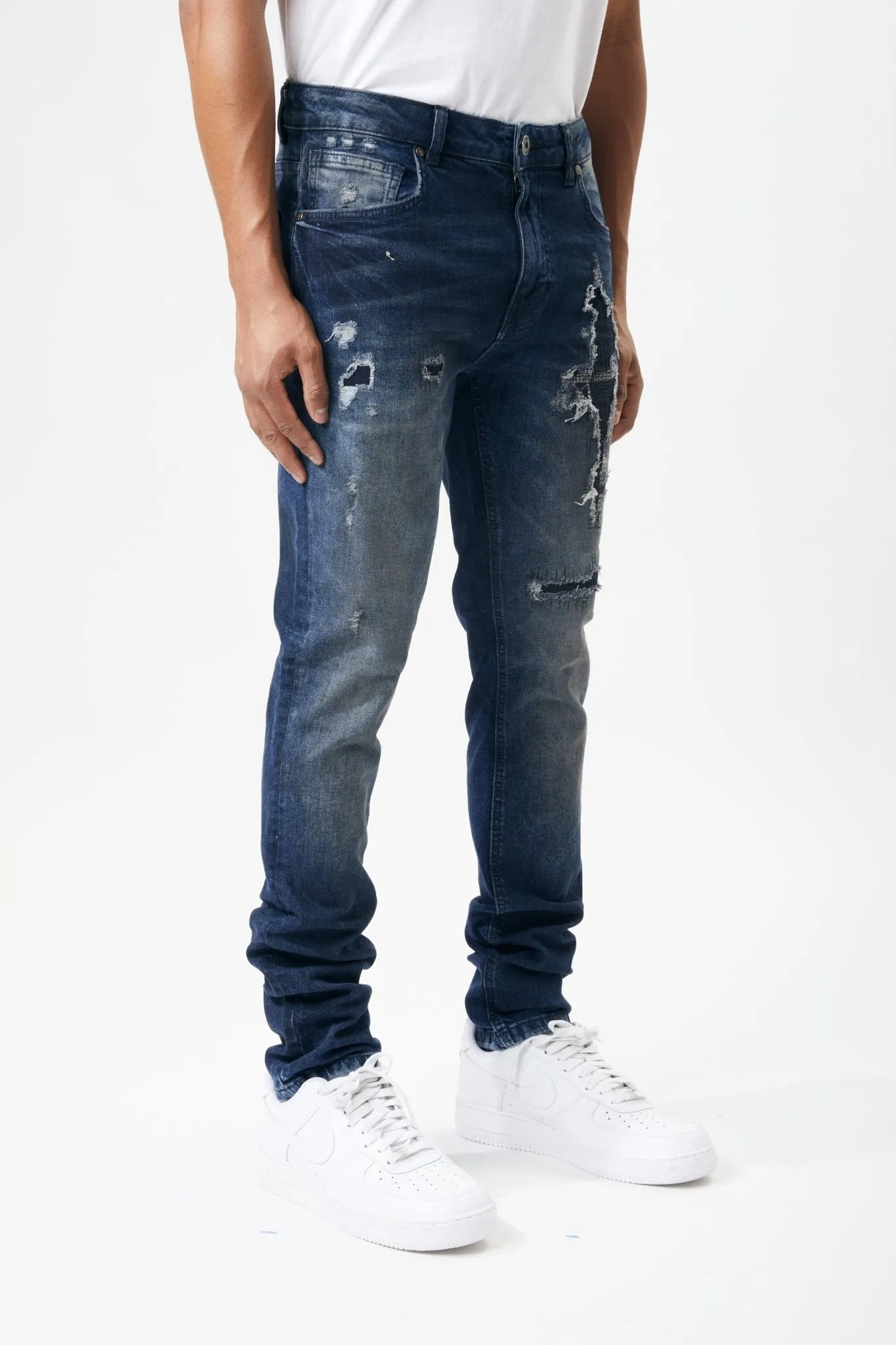 Ripped and Repaired Denim Jeans in Ink