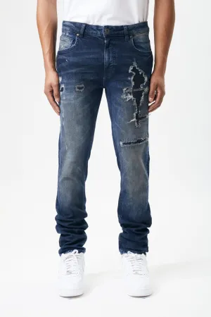 Ripped and Repaired Denim Jeans in Ink