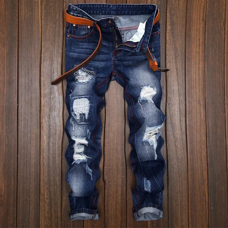 Ripped Up Skinny Jeans with Belt