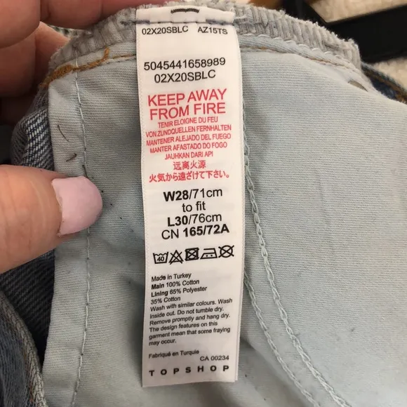 TOPSHOP Boot Cut High Rise Light Wash Ripped Knees Jeans